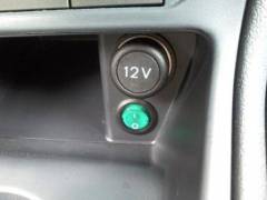 Lighting switch mounted in aux location