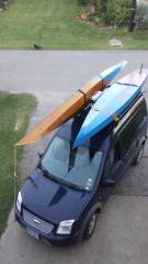 van with kayak and sup